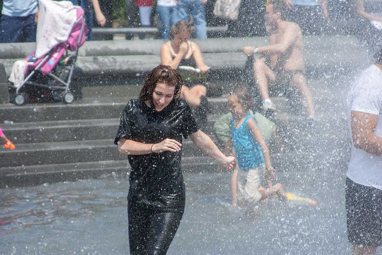 NYC Portraits - Washington Square Park fountain in summer heat